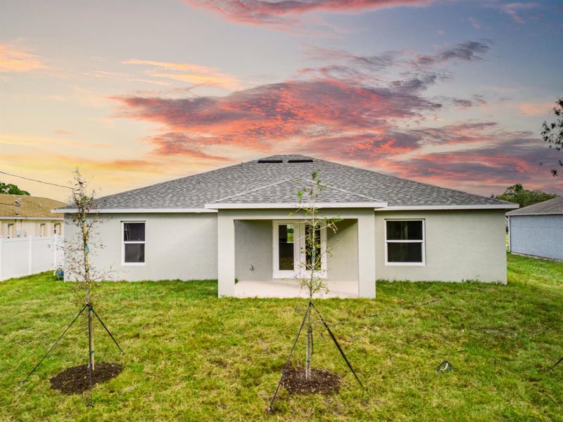 Front exterior of a new home in , Vero Beach, FL, highlighting curb appeal (Image 2).
