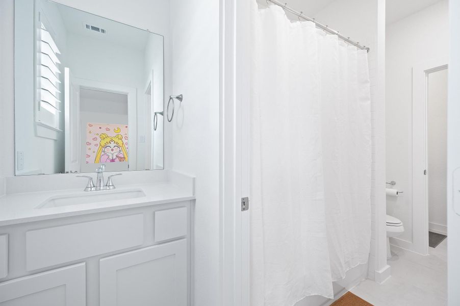 Furnished interior view inside a new home in Brookewater, Rosenberg (Image 12).