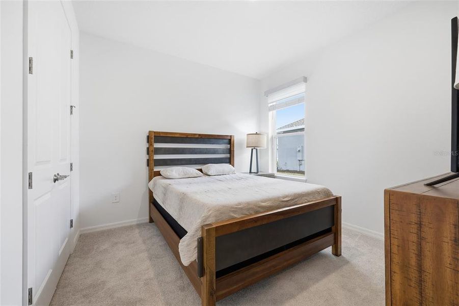 Furnished interior view inside a new home in Westview Community Group Page, Kissimmee (Image 6).