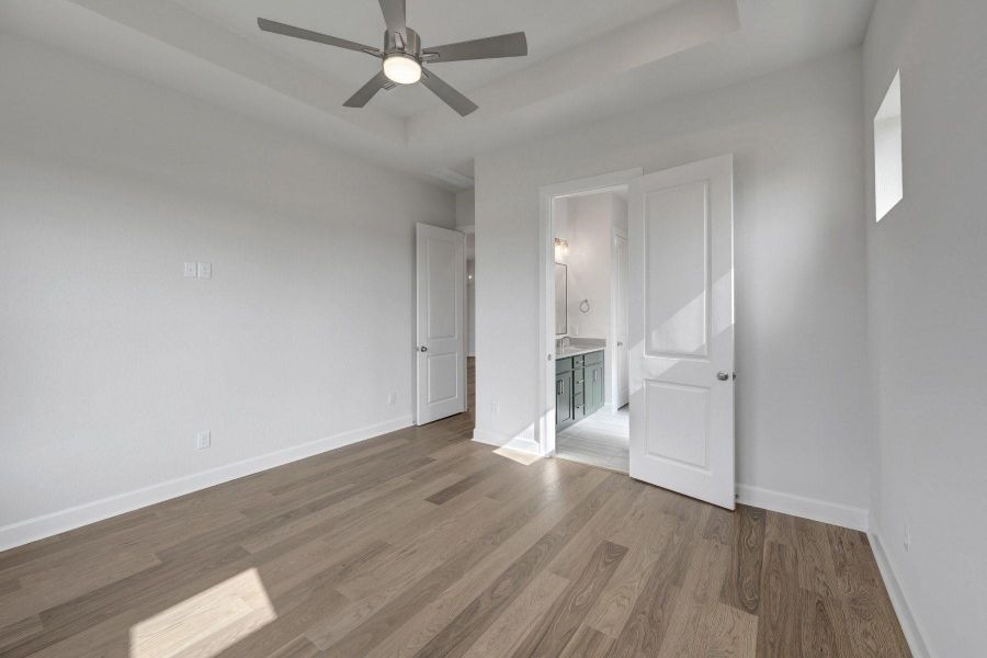 Spacious, unfurnished interior of a new home in Prairieland Village - Grove Collection, Cypress (Image 31).
