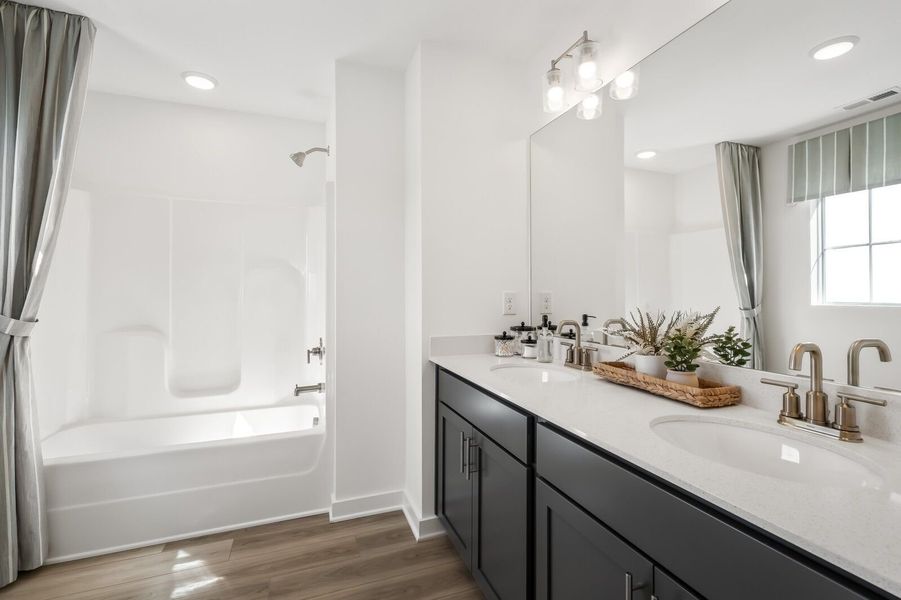 Furnished interior view inside a new home in The Towns at Red River, Gallatin (Image 29).