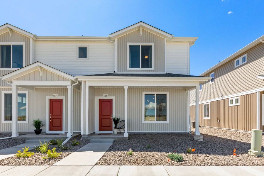 Front exterior of a new home in Banning Lewis Ranch - New Homes Colorado Springs, Colorado Springs, CO, highlighting curb appeal (Image 1). Front exterior of a new home in Banning Lewis Ranch - New Homes Colorado Springs, Colorado Springs, CO, highlighting curb appeal (Image 1).