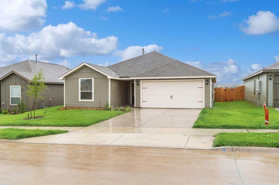 Front exterior of a new home in Big Sky Estates, Ponder, TX, highlighting curb appeal (Image 1). Front exterior of a new home in Big Sky Estates, Ponder, TX, highlighting curb appeal (Image 1).