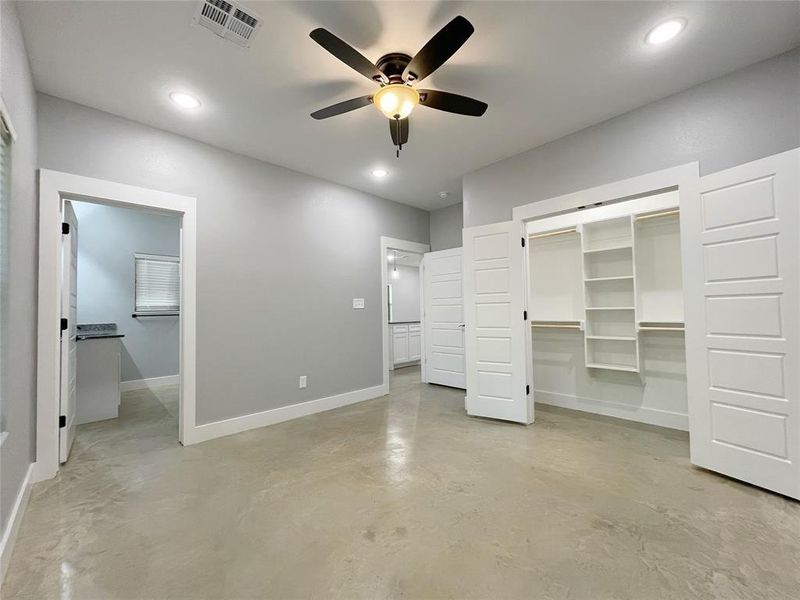 Unfurnished bedroom featuring a closet and ceiling fan