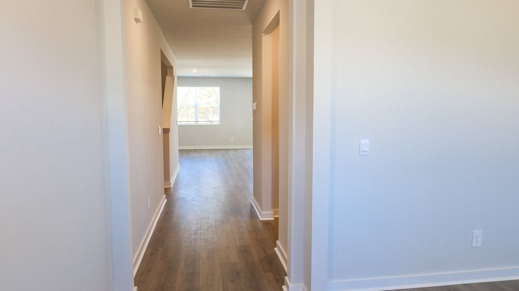 Representative unfurnished interior of a home built from the EMBRY by D.R. Horton in Harvest Point, Spring Hill (Image 23).