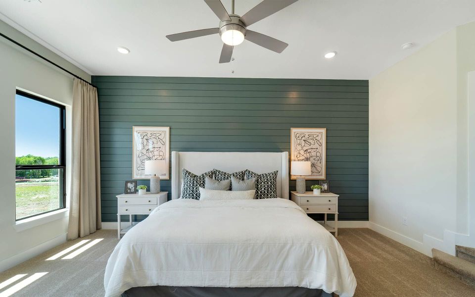 Representative furnished interior of a home built from the Rainier by CastleRock Communities in The Summit at Center Stage, Keller (Image 27).