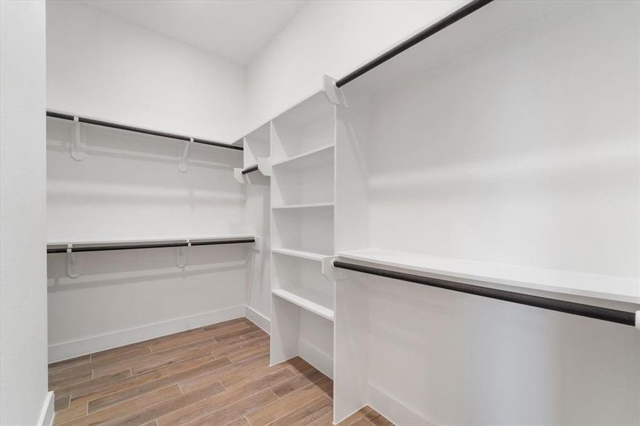 The primary bedroom includes a generously sized walk-in closet, offering ample space for organizing and storing your wardrobe.