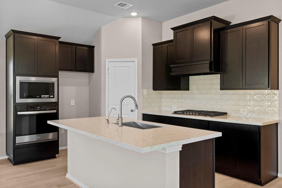 Furnished interior view inside a new home in The Highlands 45', Porter (Image 12).