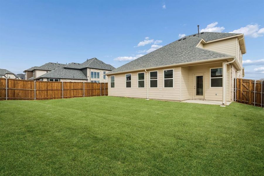 Exterior details and patio area of a home in Venetian, Weston (Image 16).