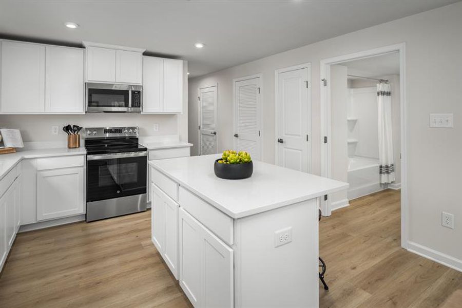 Furnished interior view inside a new home in Highland Park Condos, White House (Image 3).
