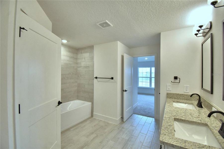 Furnished interior view inside a new home in Cadence Crossing, Auburndale (Image 11). Furnished interior view inside a new home in Cadence Crossing, Auburndale (Image 11).