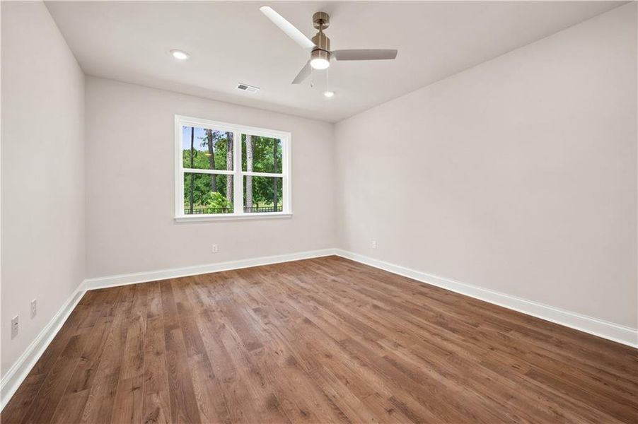 Spacious, unfurnished interior of a new home in Oak Ridge Meadows - Active Adult, Locust Grove (Image 21).