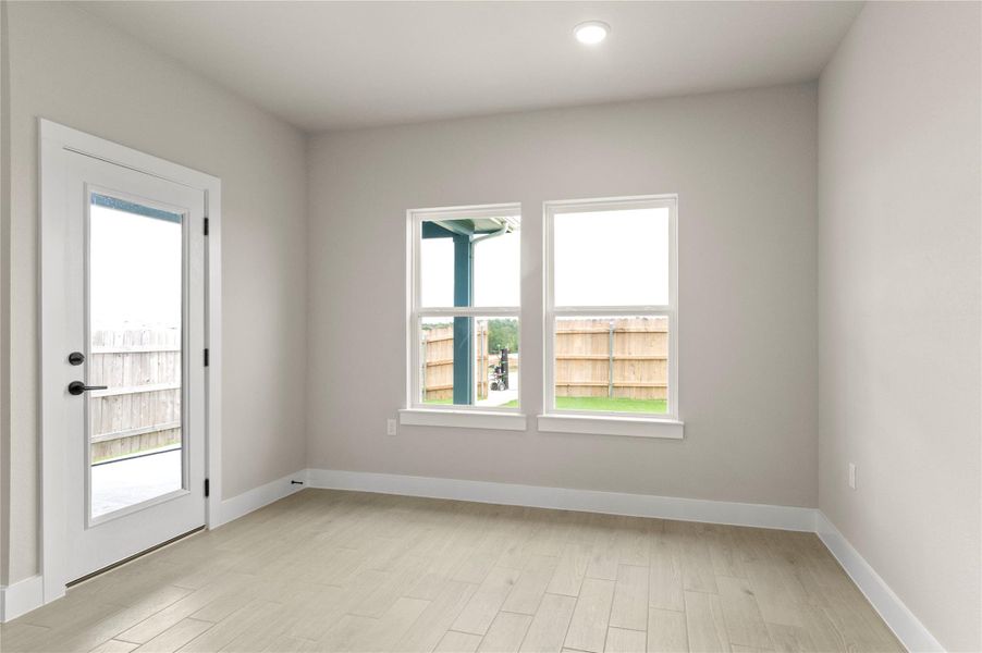 Spare room featuring light wood-type flooring, baseboards, and recessed lighting Spare room featuring light wood-type flooring, baseboards, and recessed lighting