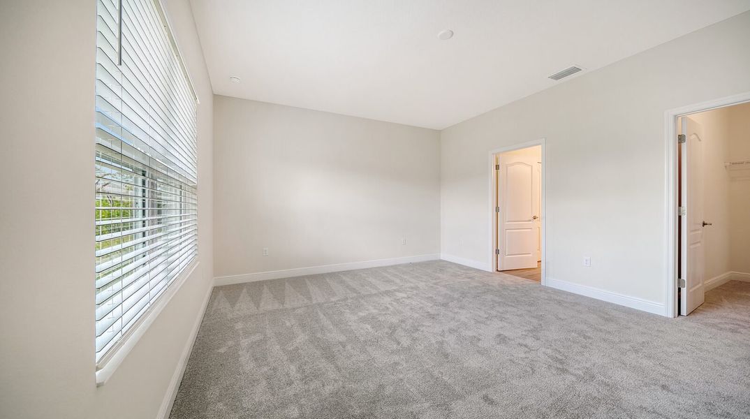 Spacious, unfurnished interior of a new home in Wildleaf at North River Ranch, Parrish (Image 18).
