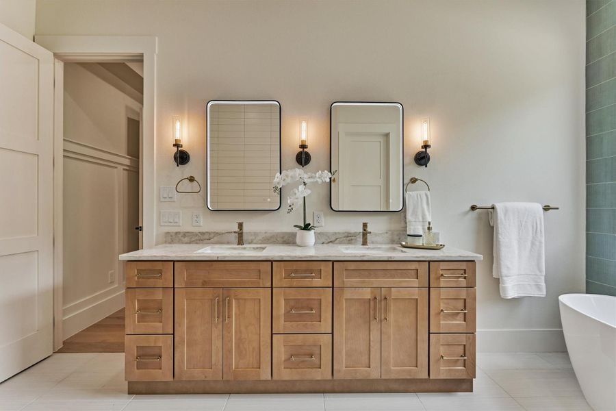 Dual vanities with quartz countertops, soft-close cabinetry, and LED anti-fog smart mirrors — every detail here was chosen with everyday luxury in mind. Dual vanities with quartz countertops, soft-close cabinetry, and LED anti-fog smart mirrors — every detail here was chosen with everyday luxury in mind.