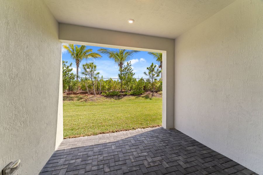 Exterior details and patio area of a home in Avila, Jensen Beach (Image 2).