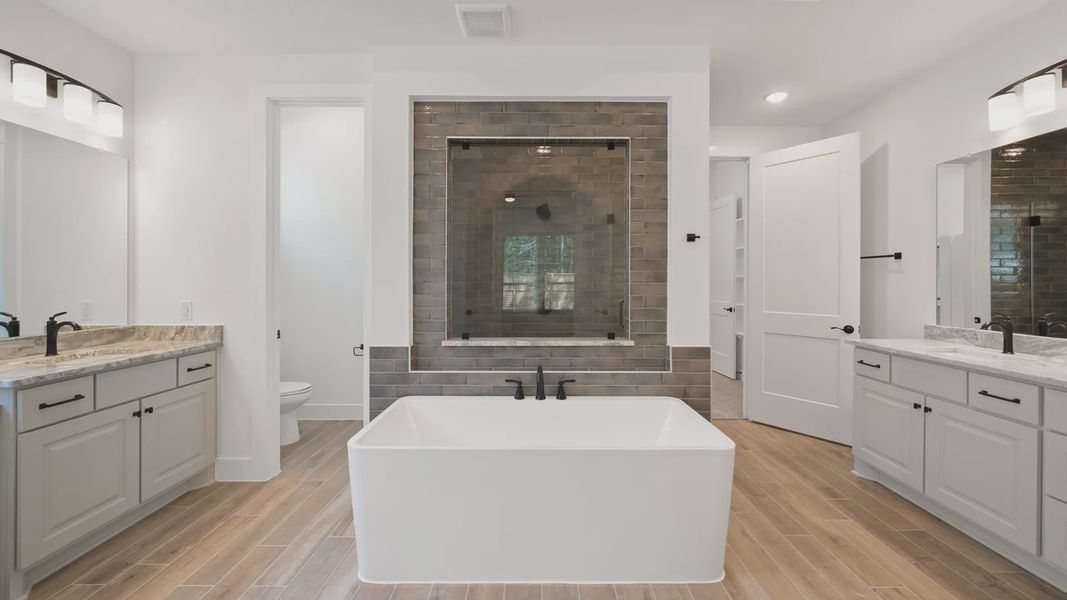 Representative furnished interior of a home built from the Waterloo by Chesmar Homes in Attwater 65's, Waller (Image 8).