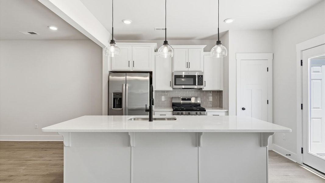 Elegant kitchen with modern finishes in this first-class villa at Marion Square near Downtown Greenville, SC Elegant kitchen with modern finishes in this first-class villa at Marion Square near Downtown Greenville, SC