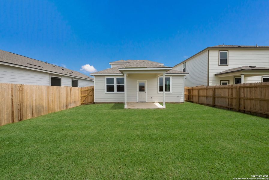 Front exterior of a new home in Talley Fields, San Antonio, TX, highlighting curb appeal (Image 17). Front exterior of a new home in Talley Fields, San Antonio, TX, highlighting curb appeal (Image 17).