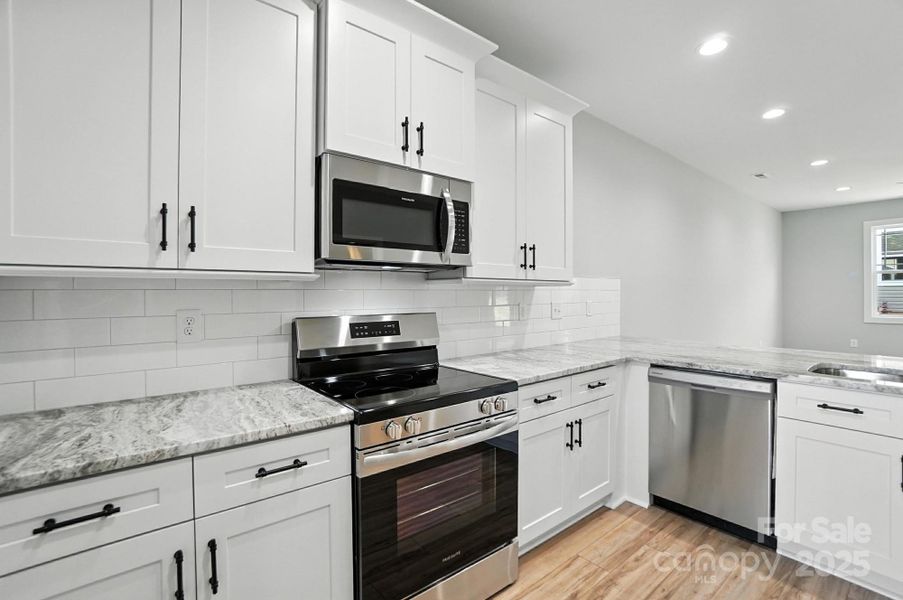 Furnished interior view inside a new home in , Hickory (Image 16).