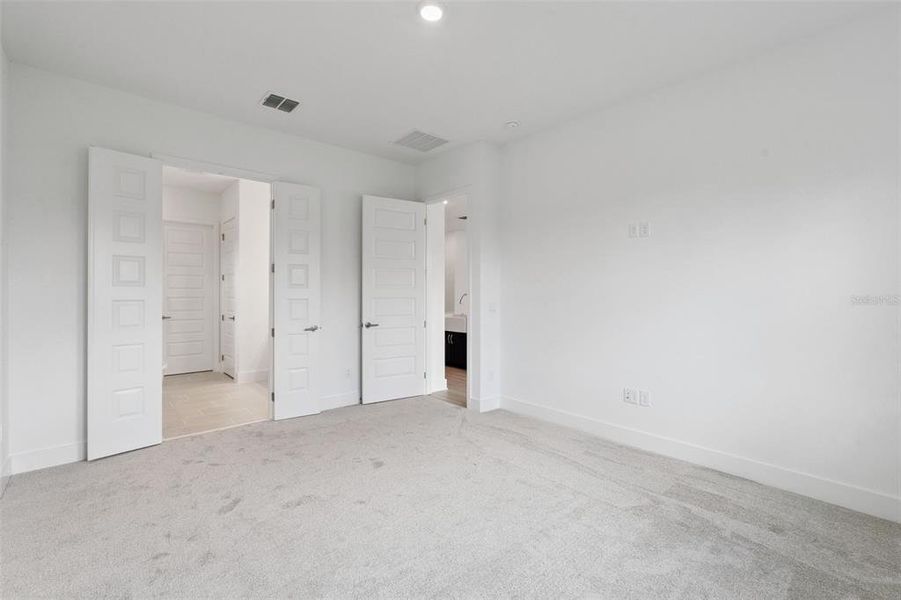 Spacious, unfurnished interior of a new home in Northlake At Ovation, Winter Garden (Image 22).