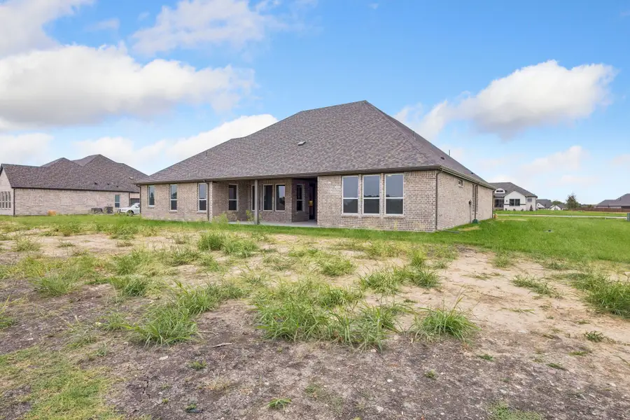 Exterior details and patio area of a home in Lakeway Estates, Waxahachie (Image 4).