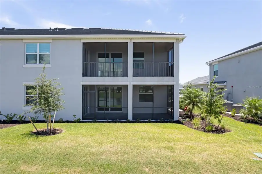 Exterior details and patio area of a home in Calusa Country Club, Lakewood Ranch (Image 4).