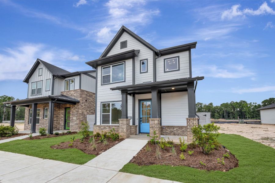 Front exterior of a new home in Two Step Farm - Cottages Row Collection, Montgomery, TX, highlighting curb appeal (Image 21). Front exterior of a new home in Two Step Farm - Cottages Row Collection, Montgomery, TX, highlighting curb appeal (Image 21).