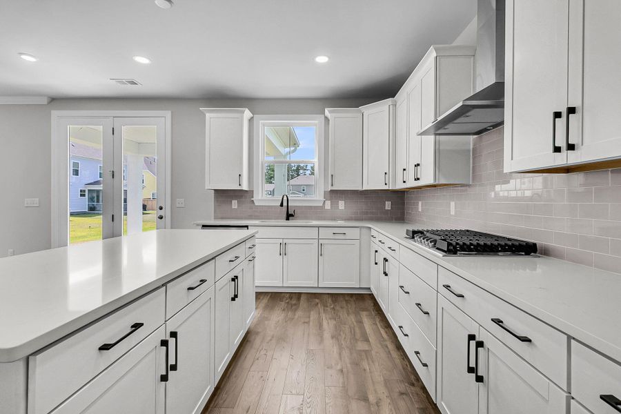 Furnished interior view inside a new home in Tidewater at Lakes of Cane Bay, Summerville (Image 9).
