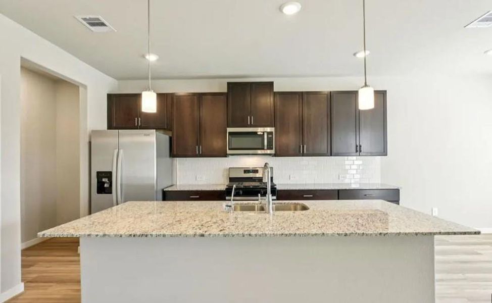 Photo is not of the actual home, but is an inspirational photo of builder’s model home and may depict options, furnishings, and/or decorator features that are not included Photo is not of the actual home, but is an inspirational photo of builder’s model home and may depict options, furnishings, and/or decorator features that are not included