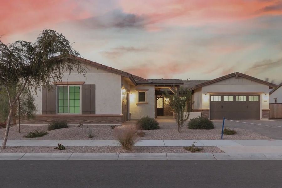 Front exterior of a new home in Bellero Estates, Queen Creek, AZ, highlighting curb appeal (Image 14).