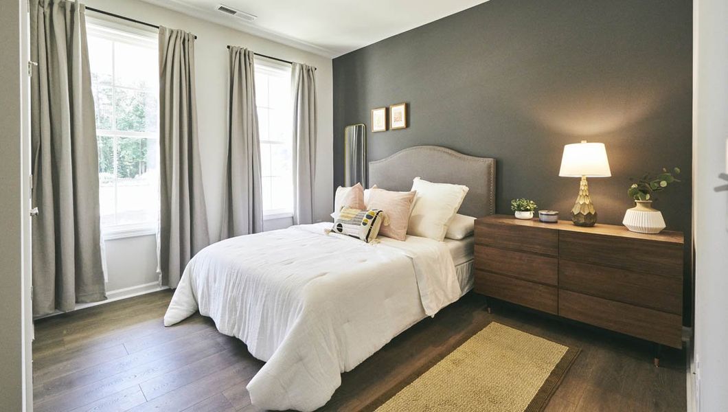 Furnished interior view inside a new home in The Villas at Kinsley, Jamestown (Image 5). Furnished interior view inside a new home in The Villas at Kinsley, Jamestown (Image 5).