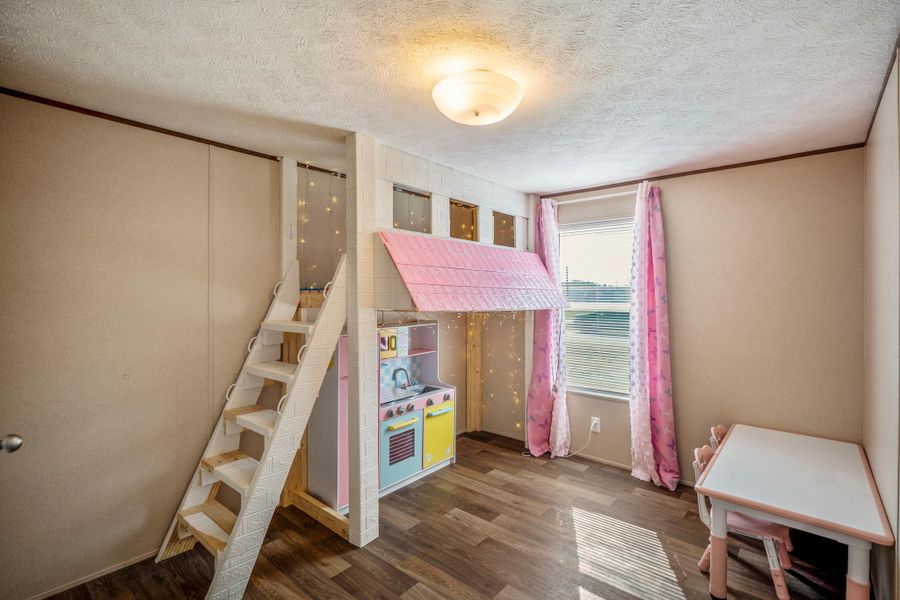 Furnished interior view inside a new home in , Conroe (Image 25).