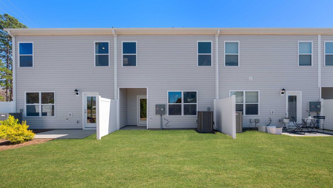Exterior details and patio area of a home in Brookside Ridge Townhomes, Greer (Image 2). Exterior details and patio area of a home in Brookside Ridge Townhomes, Greer (Image 2).
