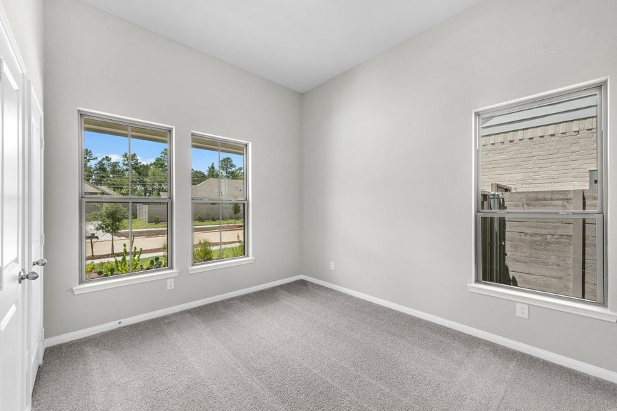 This floor plan features a full bedroom and bathroom downstairs!