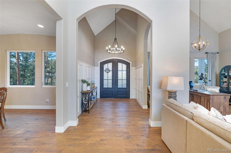 Living room looking back to grand entry.