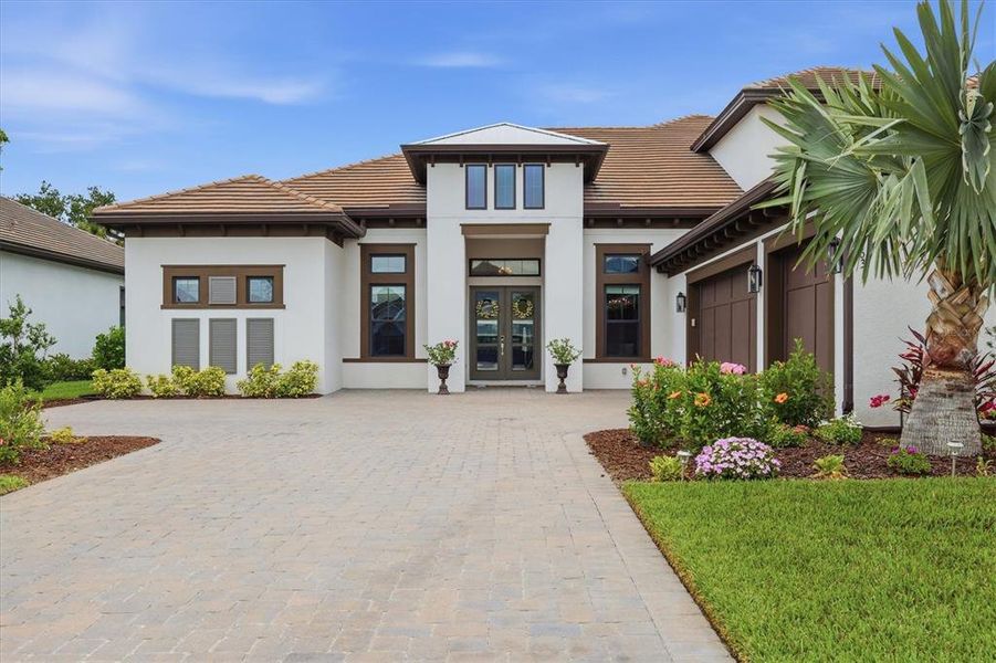 Front exterior of a new home in , Sarasota, FL, highlighting curb appeal (Image 22).