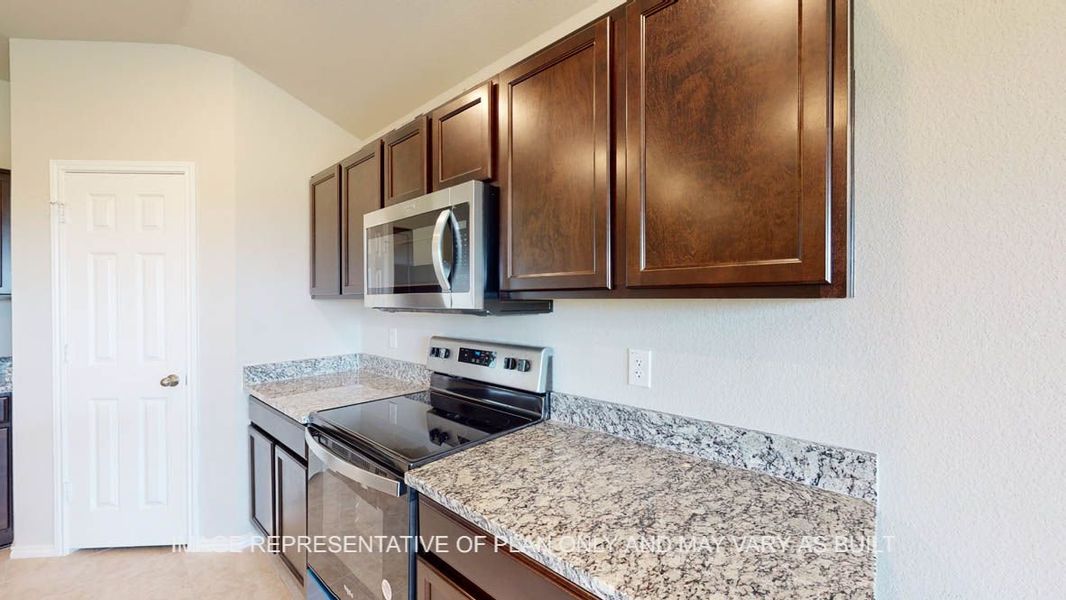 Representative furnished interior of a home built from the Bellvue by D.R. Horton in Reynolds Crossing, Killeen (Image 5).