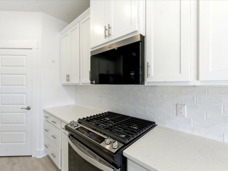 Furnished interior view inside a new home in The Coves at Lakes of Cane Bay II, Summerville (Image 26).