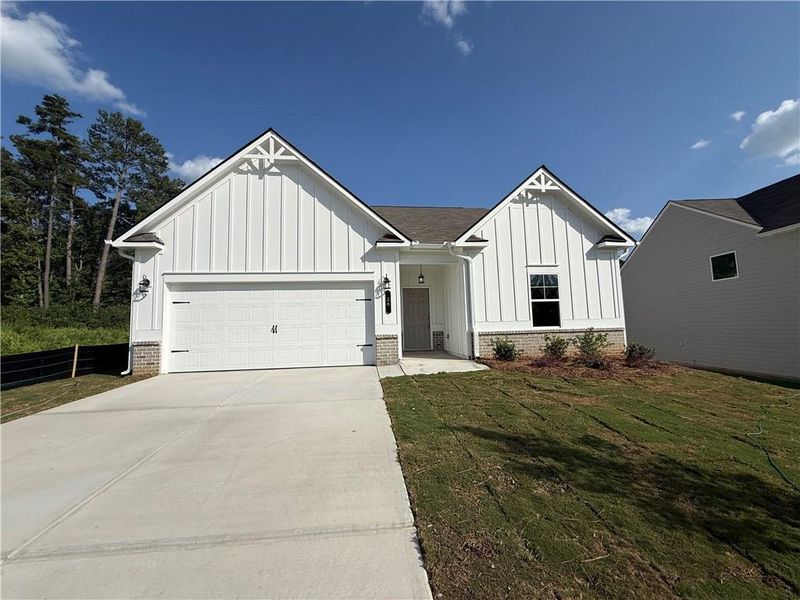 Front exterior of a new home in Maple Village, Adairsville, GA, highlighting curb appeal (Image 1). Front exterior of a new home in Maple Village, Adairsville, GA, highlighting curb appeal (Image 1).