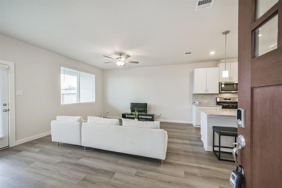 Upon entry, enjoy a comfortable living room. Upon entry, enjoy a comfortable living room.