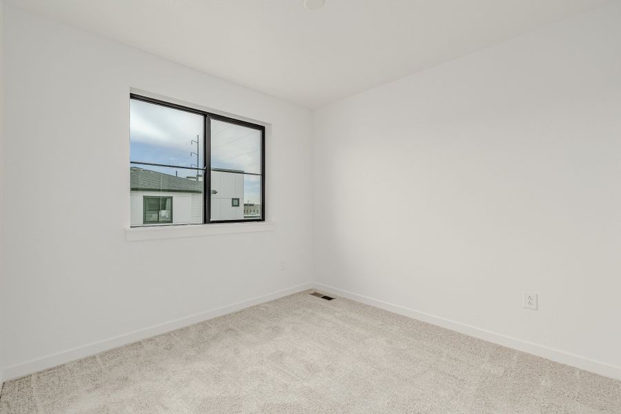 Spacious, unfurnished interior of a new home in The Hub at Virginia Village, Denver (Image 21).