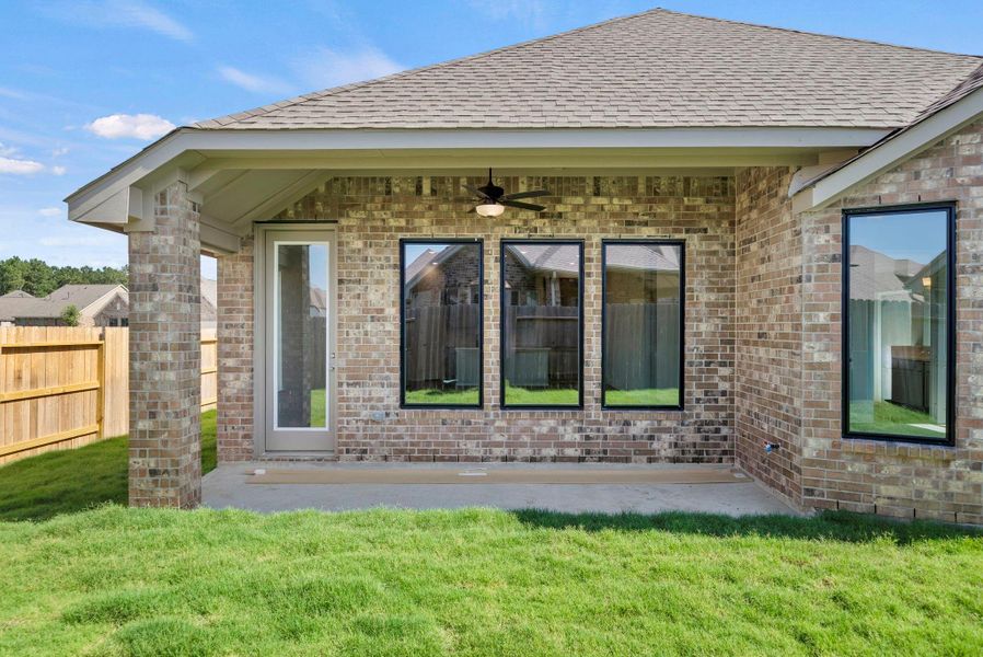 Exterior details and patio area of a home in The Trails, New Caney (Image 3).