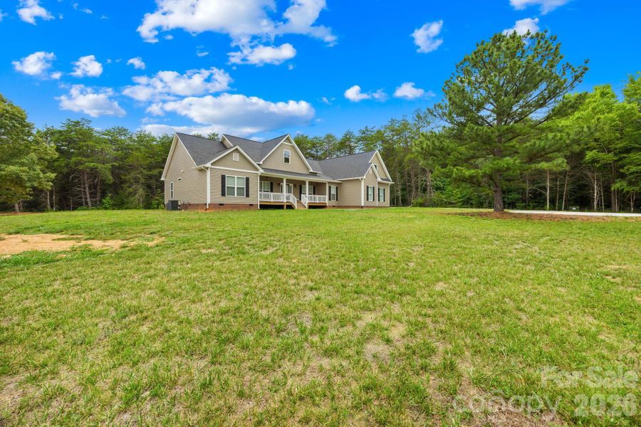 Exterior details and patio area of a home in , Reidsville (Image 3).