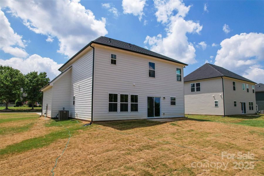 Front exterior of a new home in , Harrisburg, NC, highlighting curb appeal (Image 17).