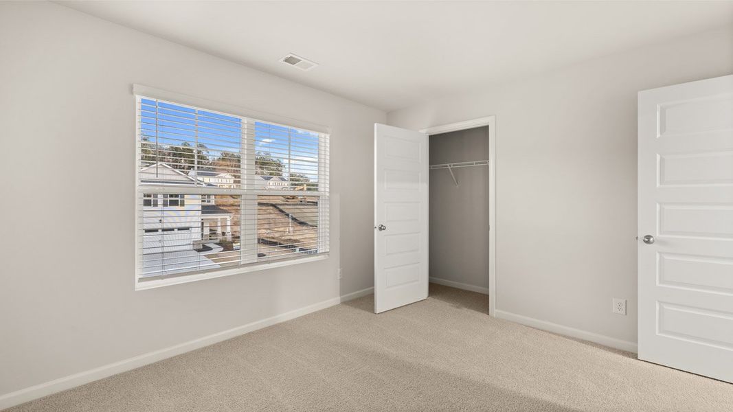 Spacious, unfurnished interior of a new home in Southwind Village, Evans (Image 48).