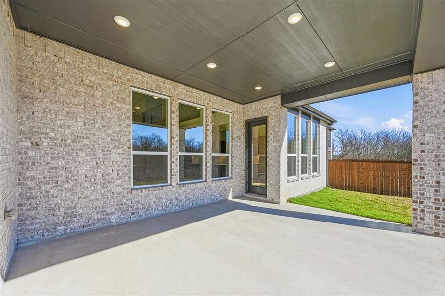 Exterior details and patio area of a home in Sonoma Verde, McLendon-Chisholm (Image 16).