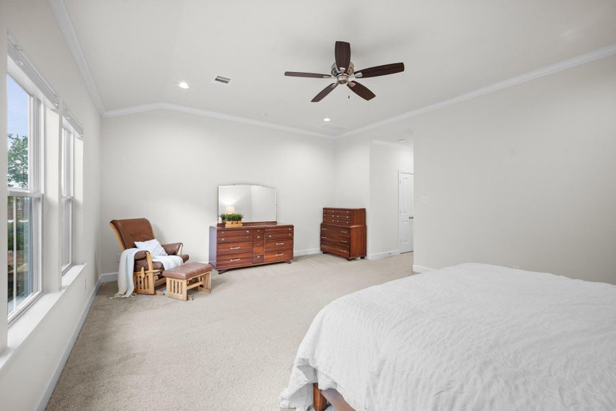 The scale of the primary suite becomes clear from this angle — plenty of room for a sitting area alongside a king bed, with two walk-in closets and a linen closet in the bath just through the door. The scale of the primary suite becomes clear from this angle — plenty of room for a sitting area alongside a king bed, with two walk-in closets and a linen closet in the bath just through the door.