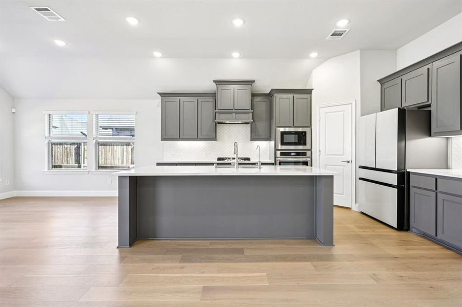 Furnished interior view inside a new home in ArrowBrooke, Aubrey (Image 16). Furnished interior view inside a new home in ArrowBrooke, Aubrey (Image 16).