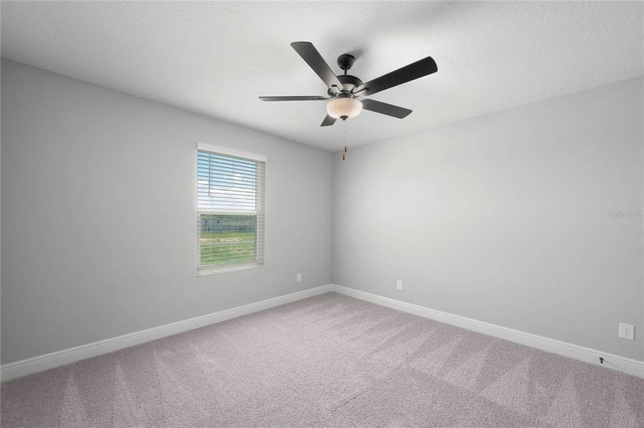 Spacious, unfurnished interior of a new home in Gum Lake Preserve, Lake Alfred (Image 15).